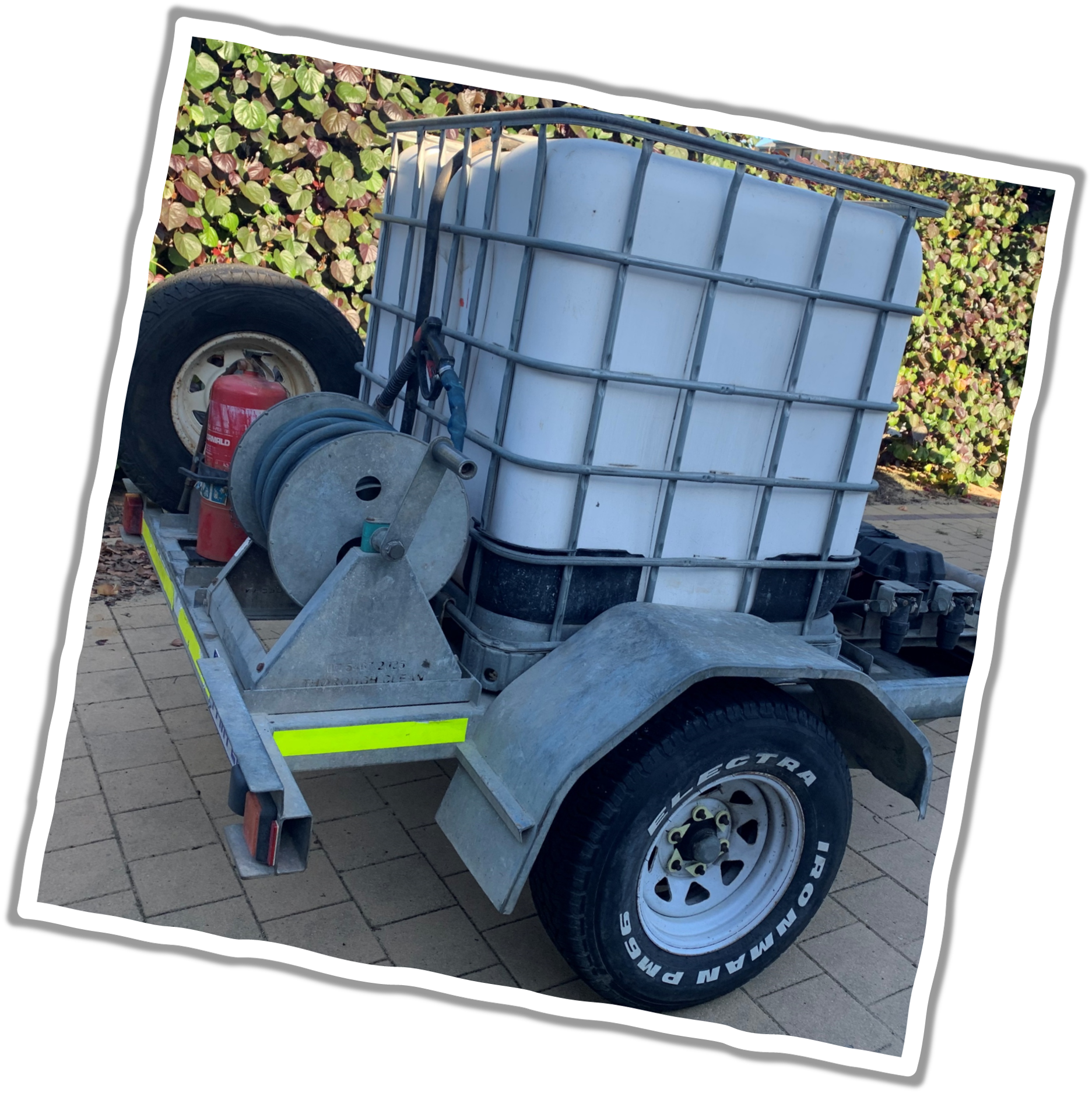 Before and after shot of pressure cleaned pavers